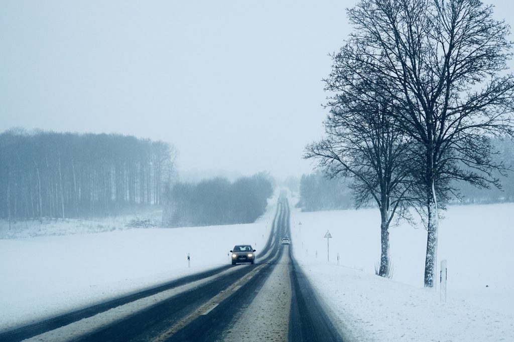 Massive winter storm knocks out power, foils holiday travel across country