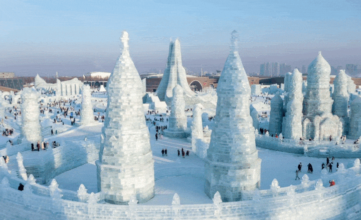 Massive ode to ice transforms into dazzling winter wonderland of color at night