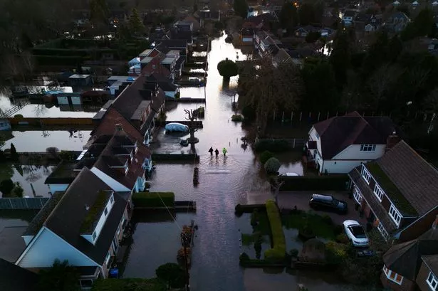 Flooding hits parts of West London after heavy rain with residents told to ‘take action now’