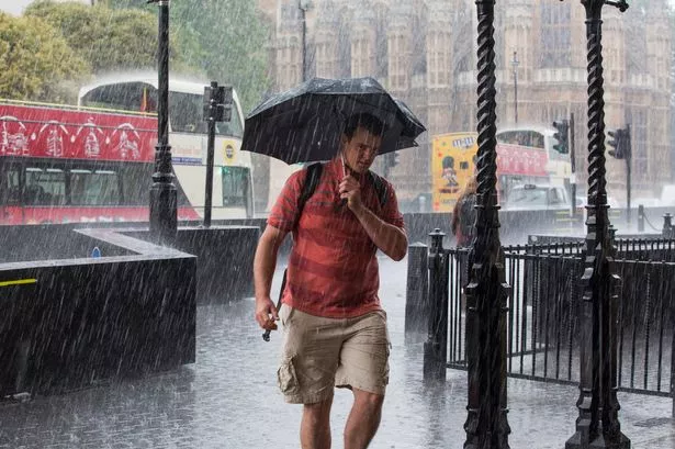 Flood warning issued in West London after torrential rain shuts two Tube stations