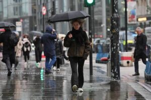 Rain and wind bring another day of disruption to parts of UK