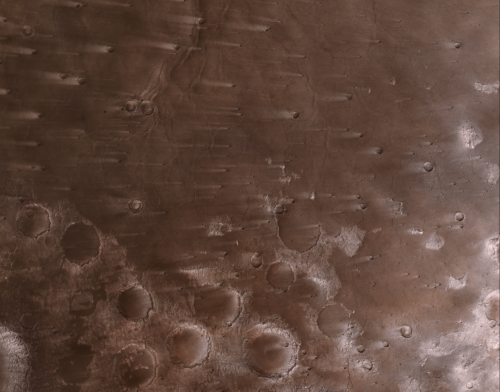 NASA’s Psyche Mission Spies Mars’ Wind-Blown Craters During Close Approach